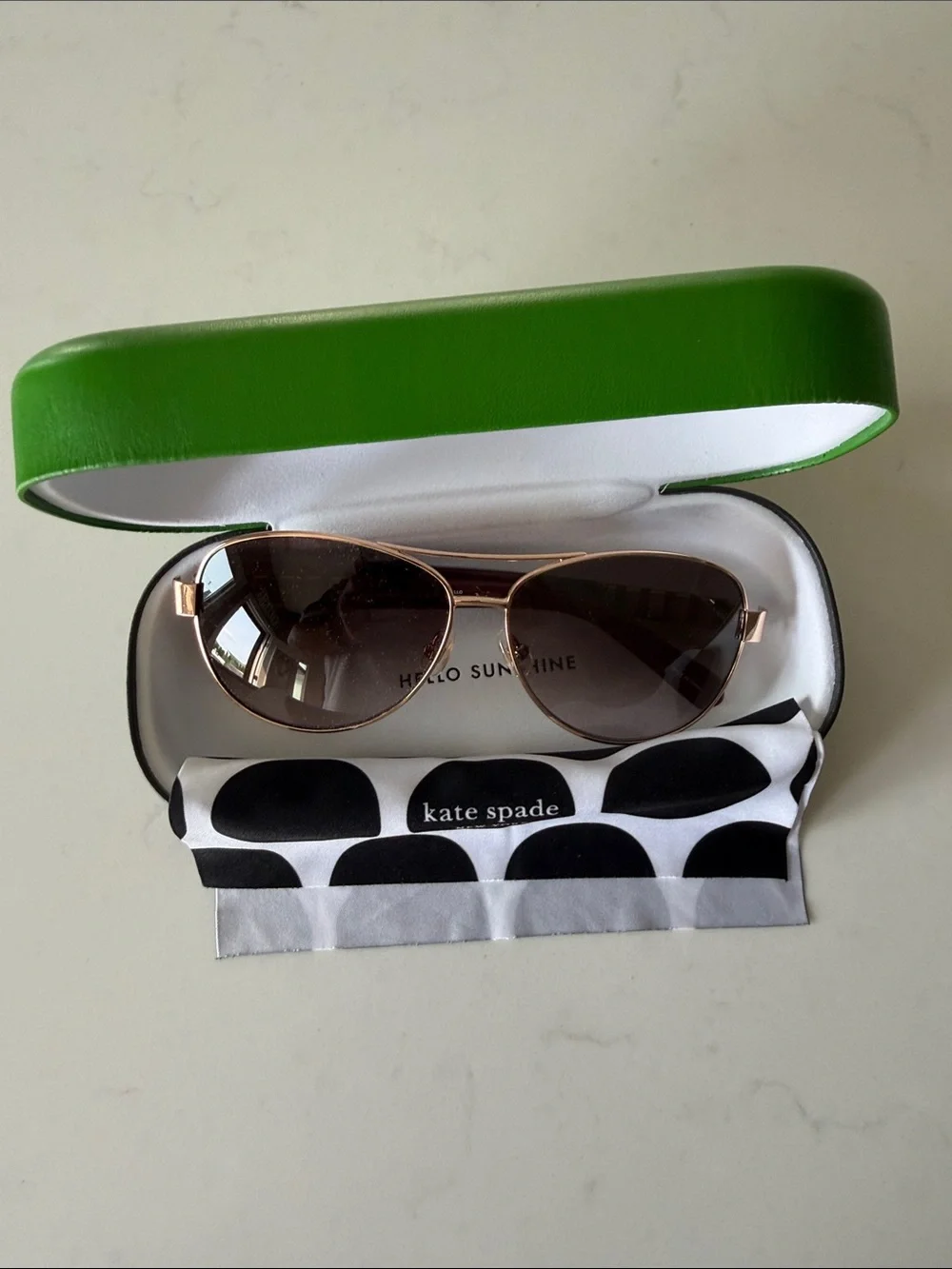 kate spade Rose Gold Frame Sunglasses with Burgundy Temples